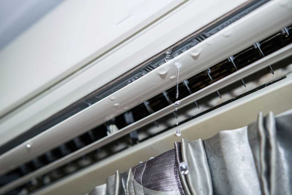 How do I stop my window air conditioner from leaking water