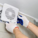 Does a bathroom exhaust fan remove moisture