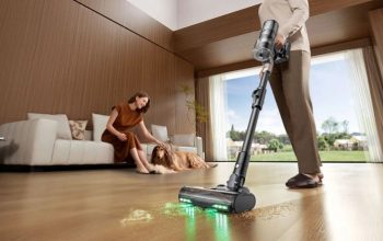 Modern cordless vacuum standing in a clean Pennsylvania home, featuring a lightweight build, rechargeable battery, and versatile floor cleaning
