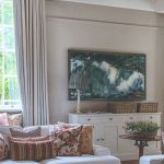 Elegant budget curtains creating a luxurious look in a modern living room.
