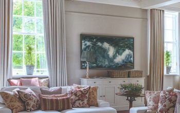 Elegant budget curtains creating a luxurious look in a modern living room.