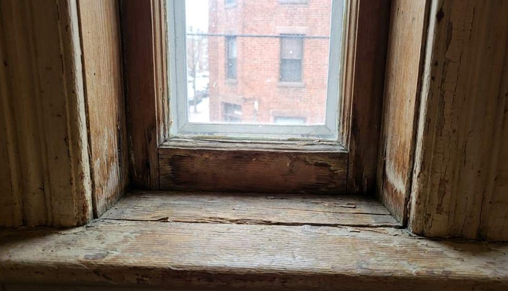 Draft entering through an old Boston home window
