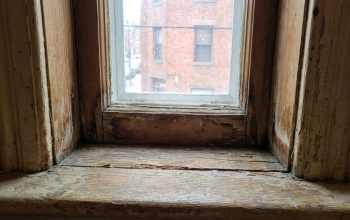 Draft entering through an old Boston home window