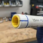 Installing a copper push-fit connector on plastic tubing